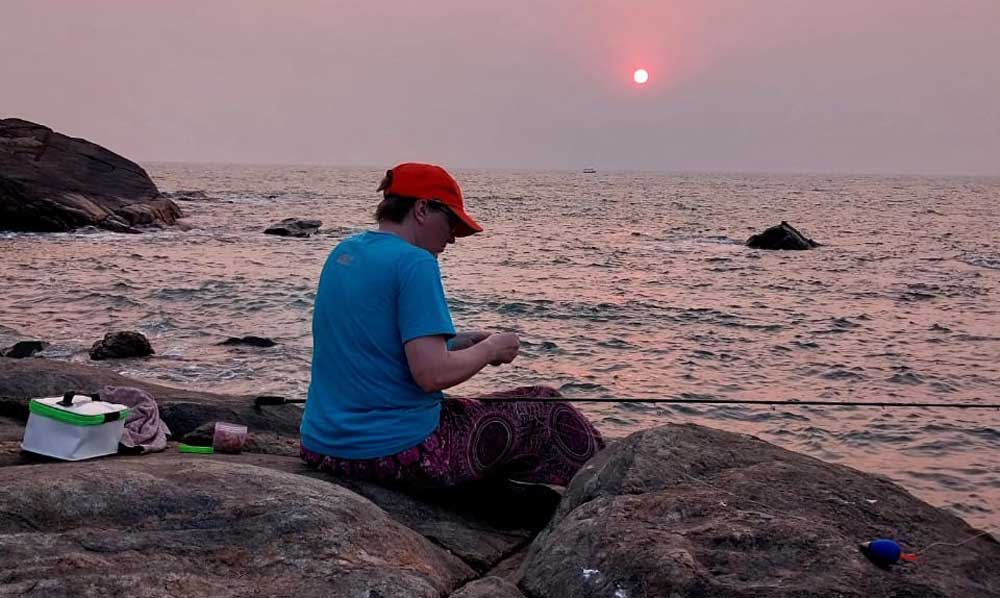 Fishing from the rocks.